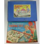 A Merit Remote Control Driving Test Game together with a Bayko 3 building set, both boxed.