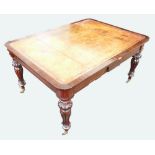Victorian rosewood partners writing table with carved fluted supports,
