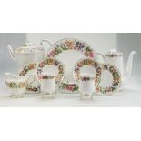 A collection of Paragon Country Rose and Belinda dinner and teaware items to include tea pots,