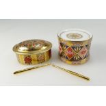 Royal Crown Derby miniature drum with drumsticks, together with another Crown Derby trinket box.