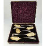 Victorian cased silver gilt dessert serving set comprising four large serving spoons together with