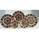 A collection of Royal Crown Derby Old Imari design wall plates together with similar smaller items