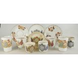 A collection of early commemorative china cups & saucers and beakers including Queen Victoria and