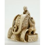 Japanese carved ivory Netsuke with signature to base. 5cm x 4.5cm wide approx. Early 20th century.