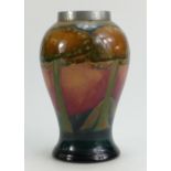 William Moorcroft Burslem vase decorated in the Eventide design with pewter top rim, height 16.
