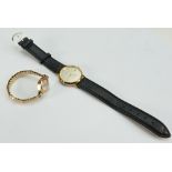Accurist 9ct gold gents wristwatch with leather strap,