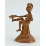 Doulton Stoneware figure of a seated boy on pedestal with tambourine on his foot by George Tinworth,