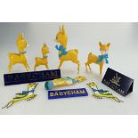 A collection of Baby Cham related items to include seven Bambi's, three advertising bar stands,