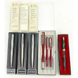 A collection of five boxed Parker Ball Point Pens