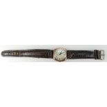 9ct gold gents vintage mechanical wristwatch with leather strap