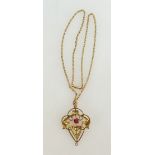 9ct Art Nouveau pendant set with red stone, 9.