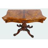 Victorian burr walnut marquetry inlaid fold over card table with shaped top,
