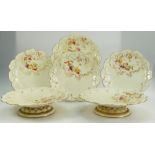 A collection of Royal Worcester dinner ware with foliage and spider decoration to include plates