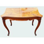 19th century carved burr walnut fold over card table on cabriole supports,