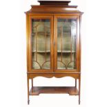 Edwardian Pagoda topped inlaid two door velvet lined display cabinet with astral glazed doors on