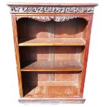 Edwardian carved mahogany open bookcase.