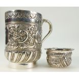 Silver christening mug, hallmarked B'ham 1897 together with a silver salt. Total weight 179.