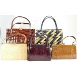 A collection of ladies handbags including ostrich leather,