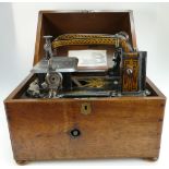 19th century Wheeler & Wilson sewing machine "The Royal" fitted in original mahogany cabinet with