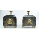 Pair 19th century Coalbrookdale cast iron tobacco jars & covers with brass tapering sticks,