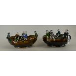 Pair Chinese stoneware dishes decorated with figures sat all around the edges of the dishes,