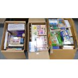 A large collection of children's toys to include various boxed jigsaw puzzles, card sets,