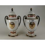 Pair of Chinese porcelain two handled vases and covers decorated with a gilded eagle in European