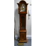 Reproduction grandmother Clock in yew wood veneered case.