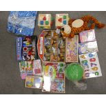 A large mixed collection of children's toys to include shape sorting cubes, Melissa and Doug,