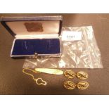 Pair 18ct gold pierced and enamelled cufflinks and an 18ct gold tiepin 11.8g