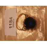 14ct gold ring set with large blue stone