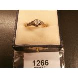 18ct gold ring with central diamond and diamond heart shaped mounts AF