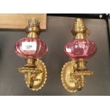 Pair gilt ormolu wall sconces for oil lamps with cranberry bowls