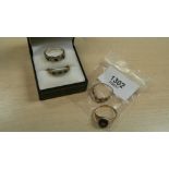 Four 9ct gold dress rings including a black onyx and diamond set example