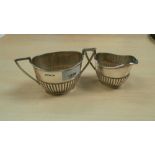 Walker and Hall double handled sugar bowl with half gadroom decoration and matching cream jug,