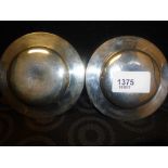 Pair of good quality small silver circular dishes the centres engraved with coat of arms, London