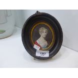 19th century painted miniature head and shoulders of a young girl in oval frame