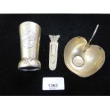 Three pieces of silver including a small leaf form bowl, small continental cup and a bookmarker