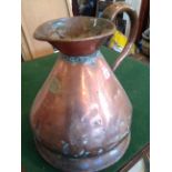 A large nineteenth century two gallon copper harvest jug by J McClashman & Co of Glasgow, rivetted
