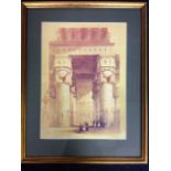 A framed David Roberts Egyptian print with figures in foreground.