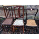 A mahogany bedroom chair with swag ribbon decoration to splat, having upholstered seat on turned