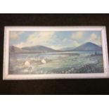 A rectangular framed Alan Charlton coastal landscape print.