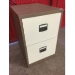 A modern two drawer filing cabinet.