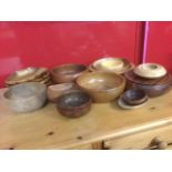 A collection of hardwood turned bowls and platters - myrtle, tropical woods, oak, beech, ash,