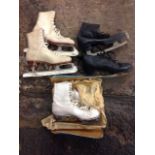 Three pairs of vintage leather ice skating boots by Simlam, Fagan and John Wilson. (3)