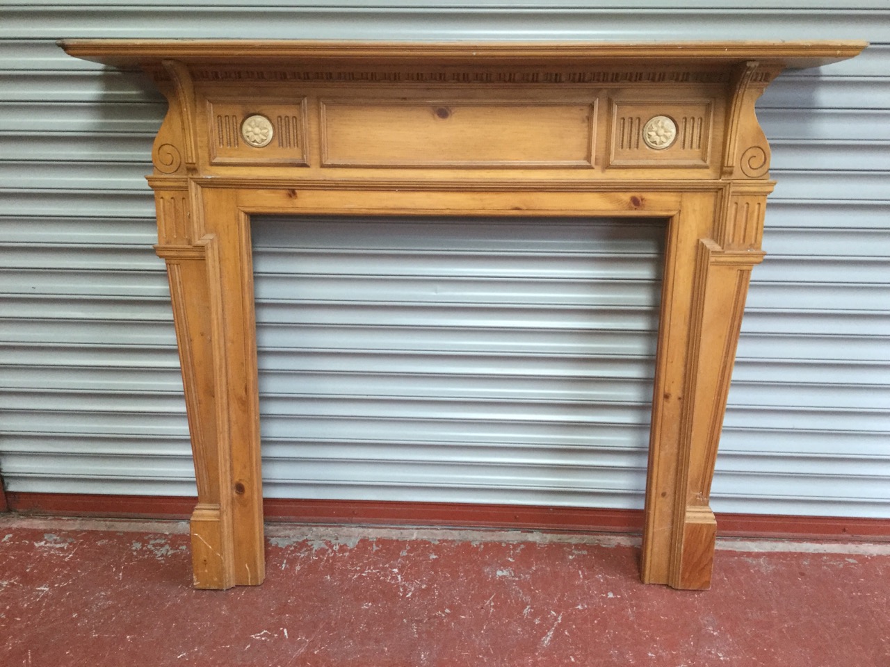 A reproduction hardwood chimneypiece