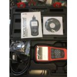 A cased Autel vehicle diagnostic kit, the MaxiDiag Elite series machine complete with disc, cables,