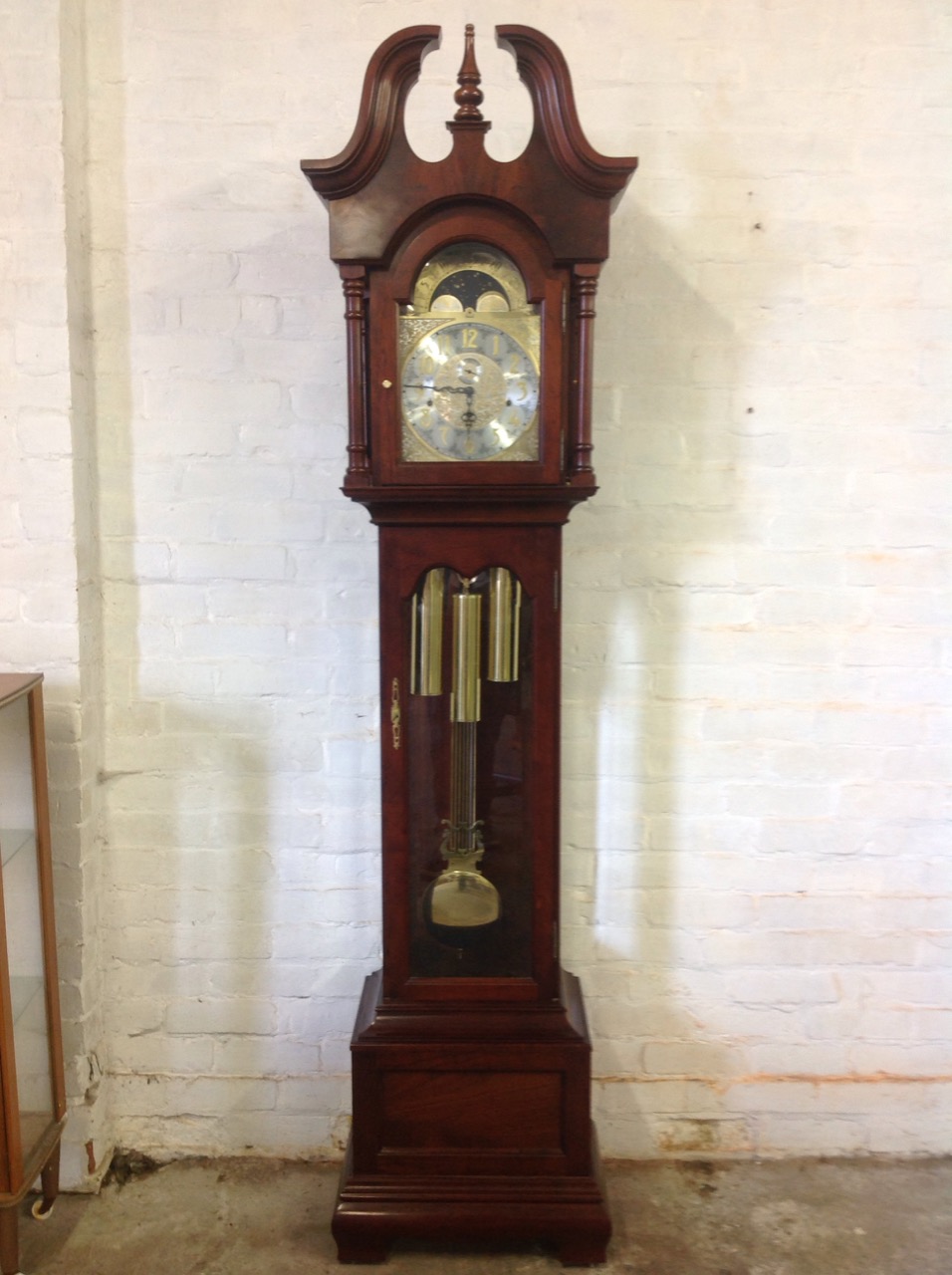 A reproduction Georgian style mahogany longcase clock