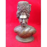 N Errington, a faux bronze bust of a military gentleman - incised signature. (8in)