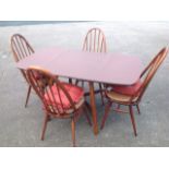 An Ercol dining table & chair set.